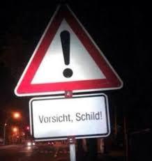 *=
Vorsicht, Schild!