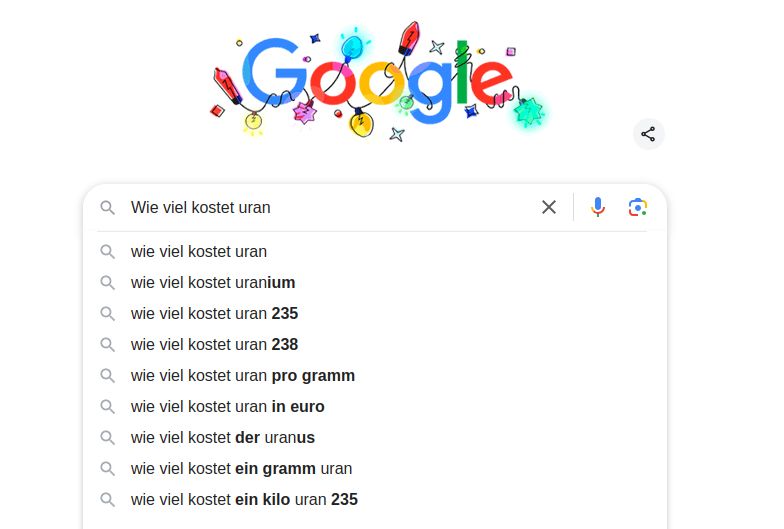 Ein Screenshot von Google-Suchvorschlägen, die sich auf den Preis von Uran beziehen. Die Suchleiste ist mit dem Text "Wie viel kostet uran" ausgefüllt. Darunter sind Vorschläge, die den Preis genauer spezifizieren, wie nach dem Preis von Uran in verschiedenen Mengen oder Einheiten gefragt wird.