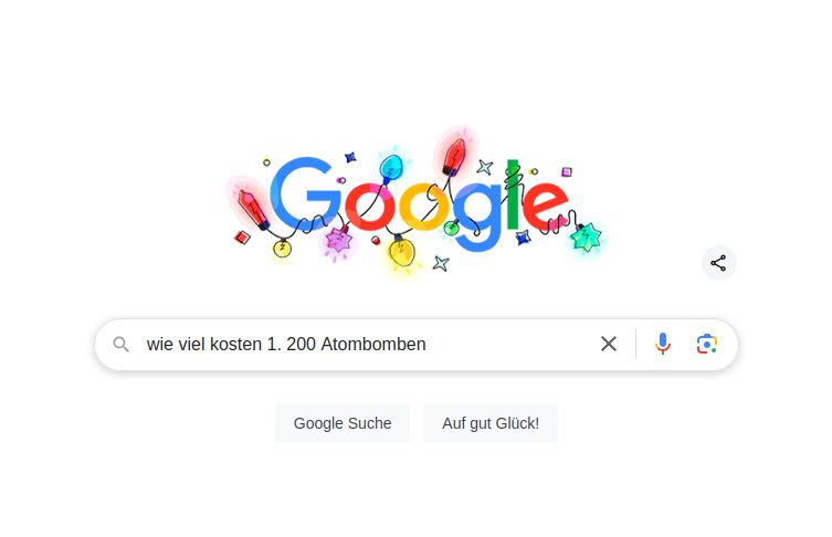 Ein Screenshot der Google-Suchleiste mit dem Text "wie viel kosten 1.200 Atombomben".